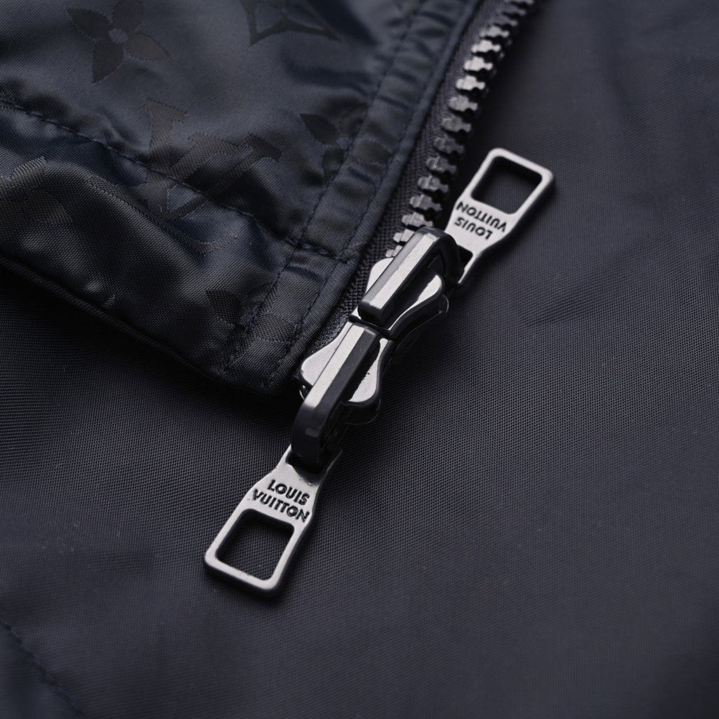 Louis Vuitton Reversible Windbreaker Jacket featuring Leather Logo Patch and Tonal Jacquard Pattern