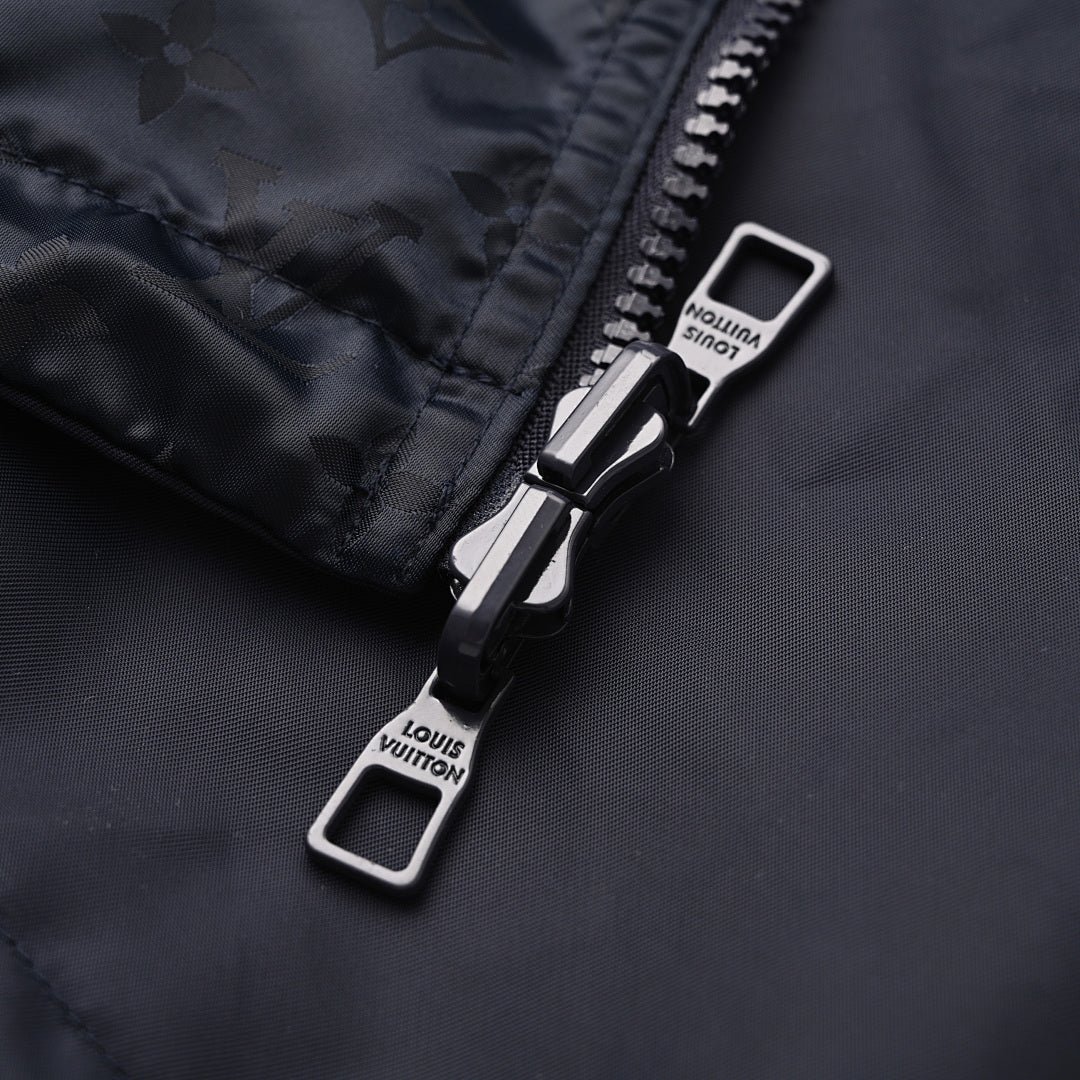Louis Vuitton Reversible Windbreaker Jacket featuring Leather Logo Patch and Tonal Jacquard Pattern