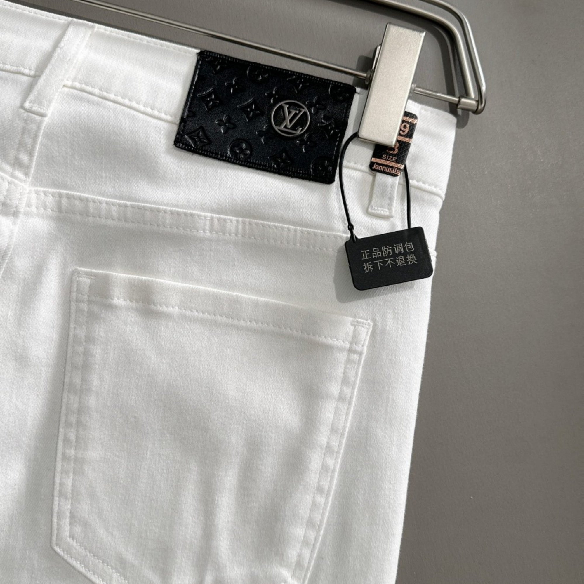 Louis Vuitton Logo-Embroidered Jeans